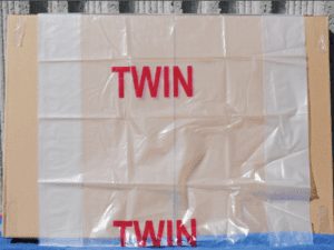 Twin protective mattress cover